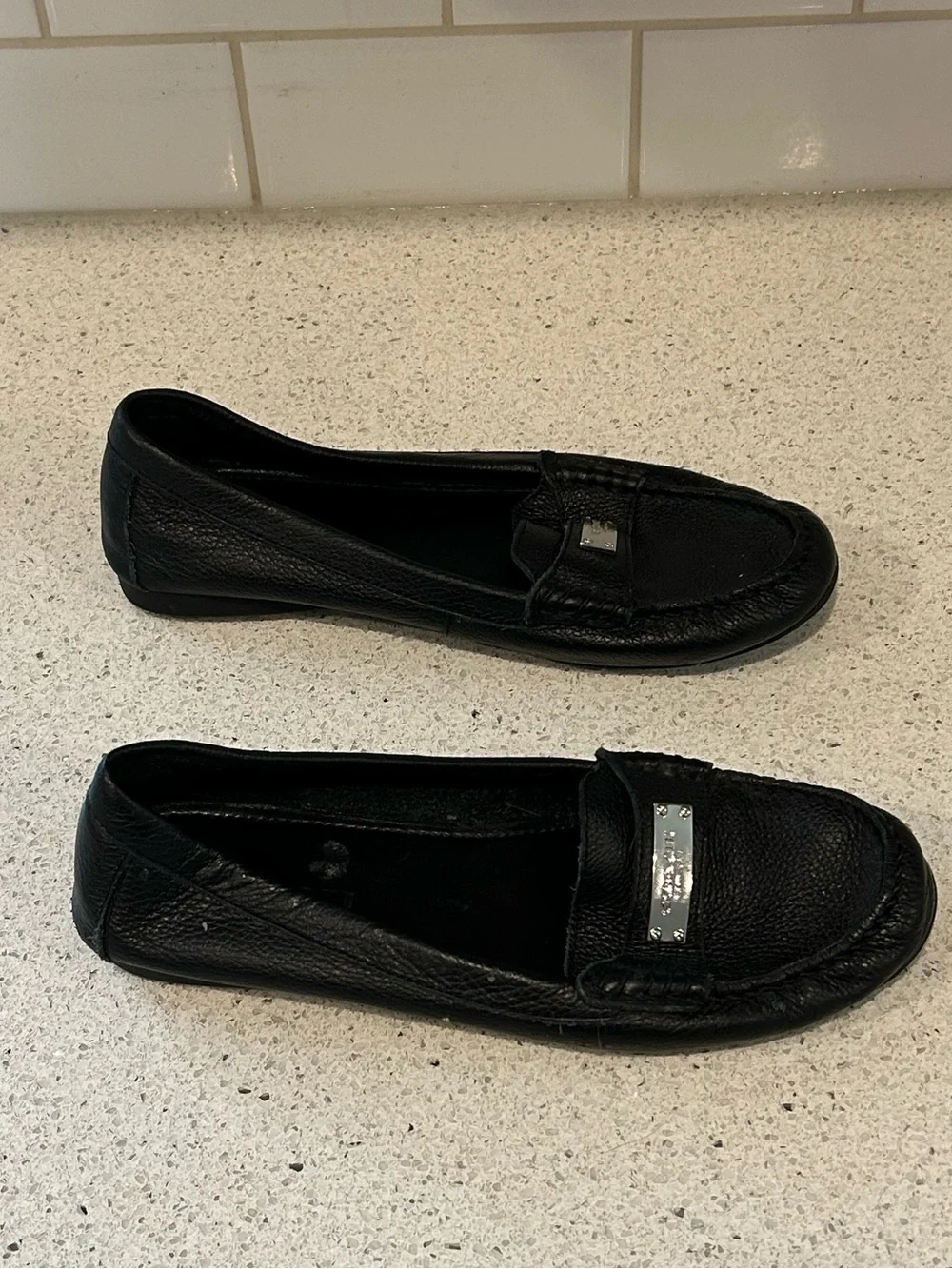 Coach sleek black